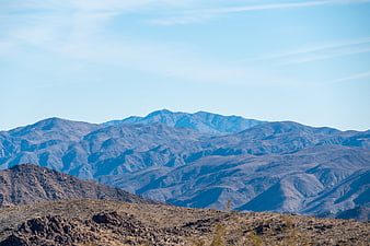Scenic Desert Mountain Range Landscape with Blue Sky