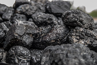 Close-up of rough black coal rocks texture
