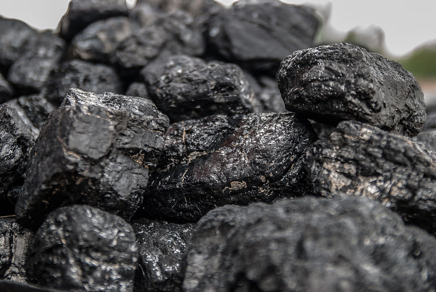 Close-up of rough black coal rocks texture