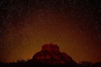 Starry Night Sky Over Red Rock Butte Landscape