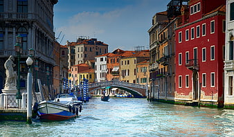 Venice Canal View With Historic Buildings And Bridge
