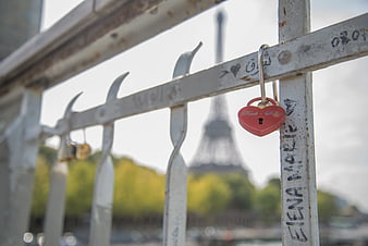 Red Heart Padlock on Paris Bridge with Eiffel Tower