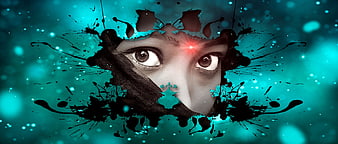 Mystical female face with glowing third eye and black ink splatters