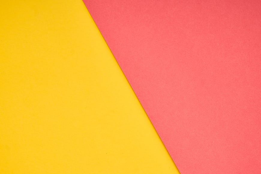 Minimalist Geometric Background With Yellow And Pink Paper Sheets