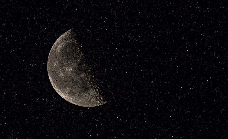 Crescent Moon in Starry Night Sky