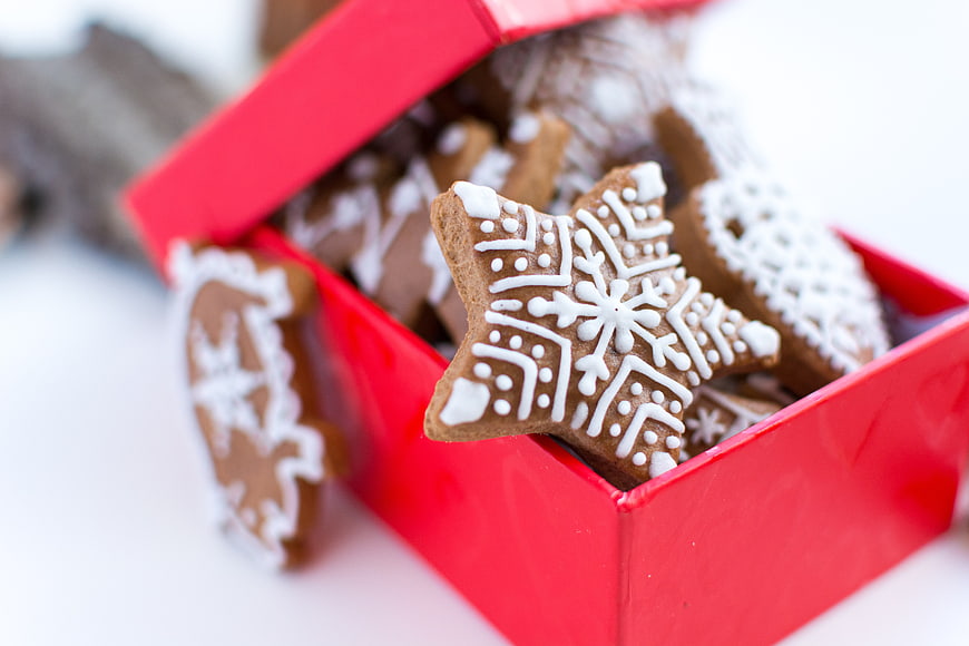 Traditional Christmas gingerbread cookies in a red box
