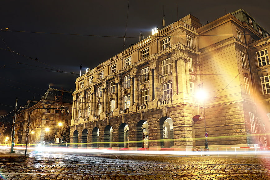 Night long exposure of historic European architecture with light trails