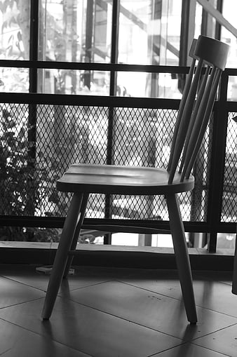 Minimalist Wooden Chair in Black and White Interior
