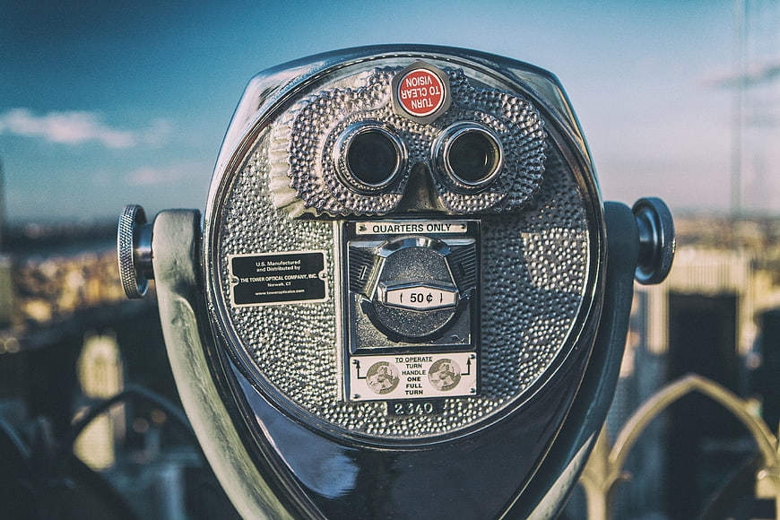 Close-up of a vintage coin-operated binocular viewer in New York City