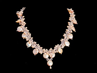 Luxurious Gold Pearl and Diamond Necklace on Black Background
