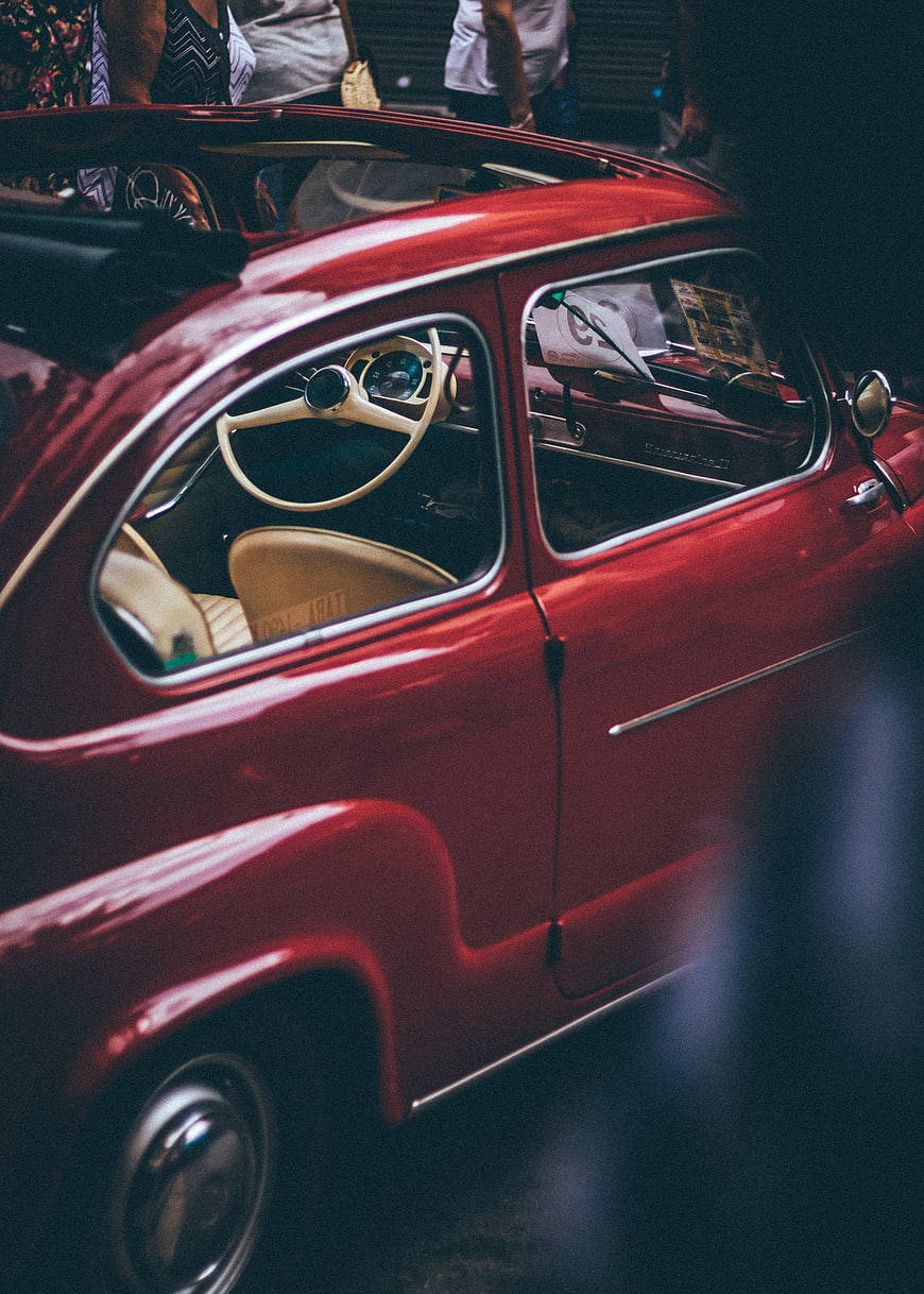 Close-up of vintage red Fiat 500 classic car
