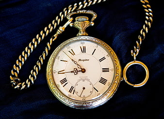 Vintage Gold Pocket Watch on Blue Velvet