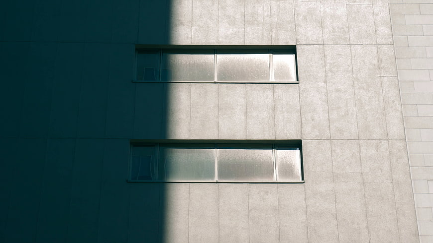 Modern Concrete Building Facade with Horizontal Windows