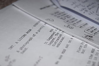 Close-up of screenplay pages with handwritten notes and edits