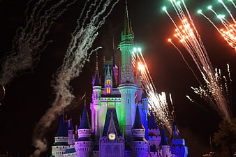 Disneyland Sleeping Beauty Castle Illuminated By Colorful Night Fireworks