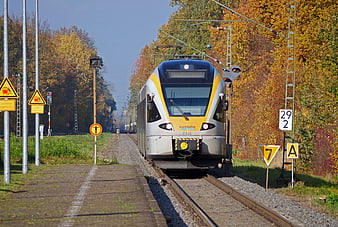 Eurobahn Flirt Electric Train Arriving At Autumn Railway Station