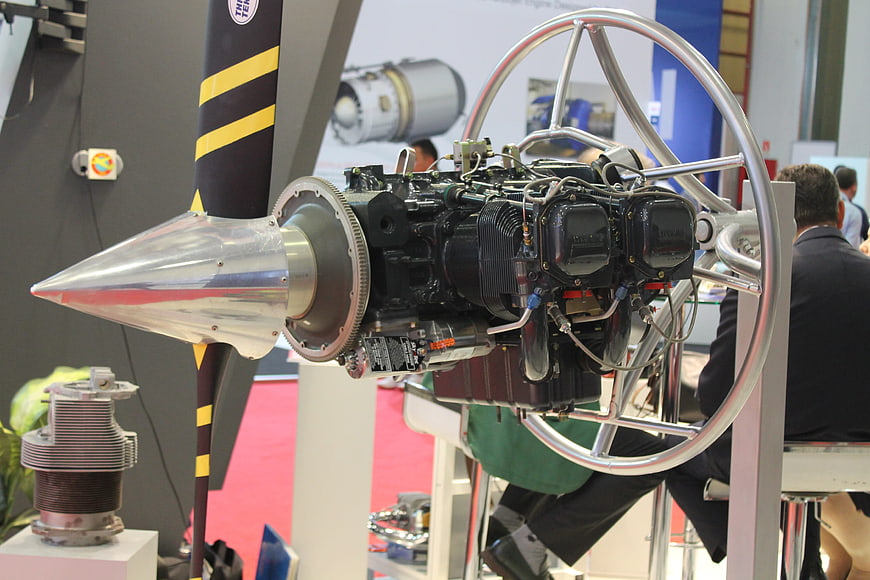 Aviation engine with propeller on display at trade show