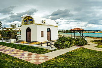 White Orthodox Chapel by the Sea in Ayia Napa Cyprus