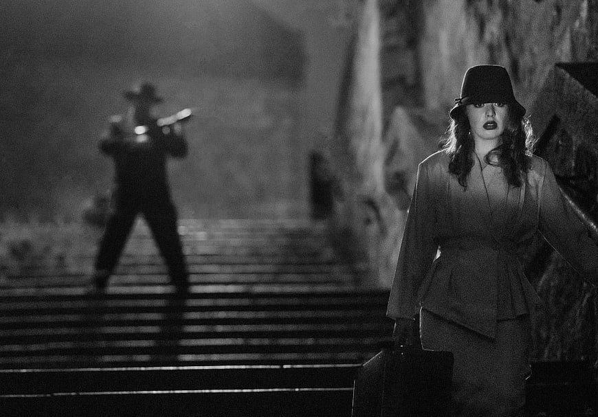 Film Noir Woman Walking Past Silhouette with Gun