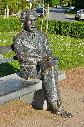 Bronze Statue of Albert Einstein Sitting on a Park Bench
