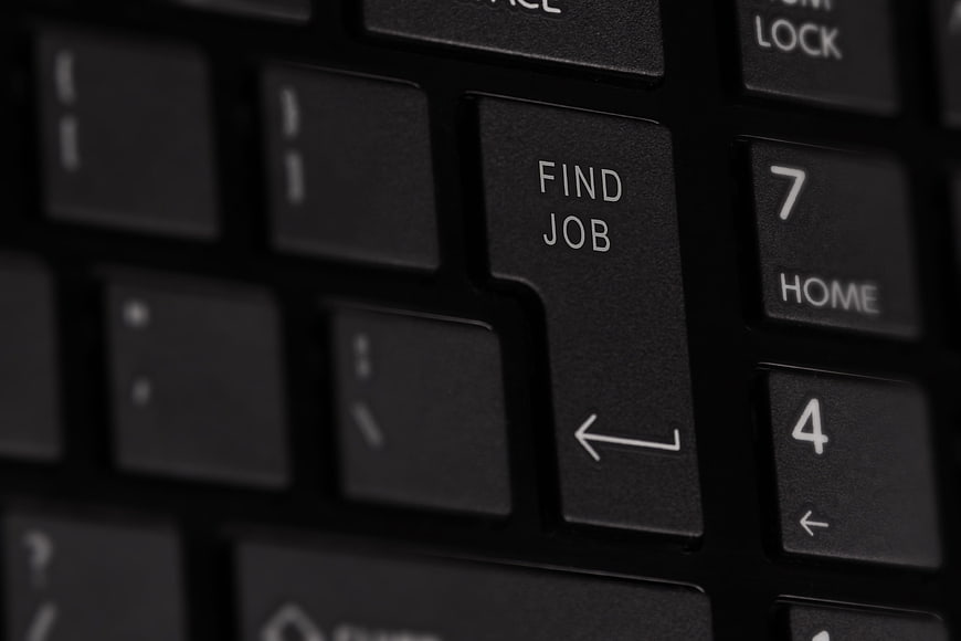 Close-up of black keyboard with 'Find Job' enter key