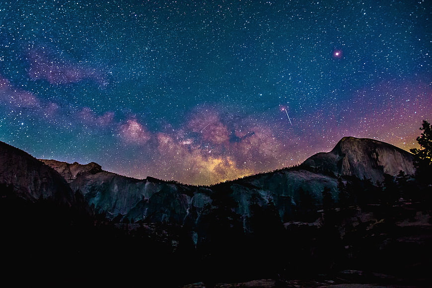 Milky Way Galaxy Over Mountain Landscape At Night