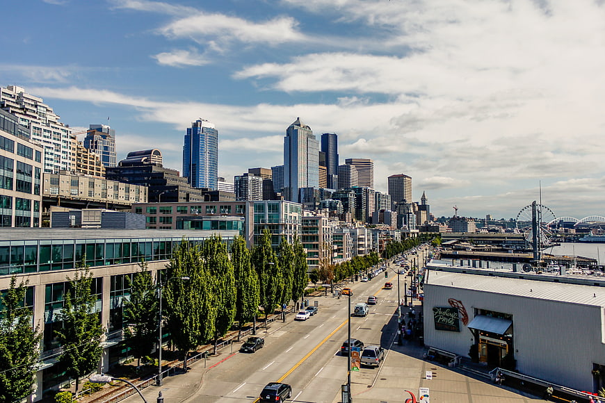 Seattle waterfront skyline with Ferris wheel and city traffic