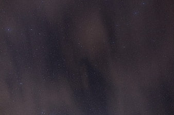 Dark Night Sky With Stars and Nebula Dust