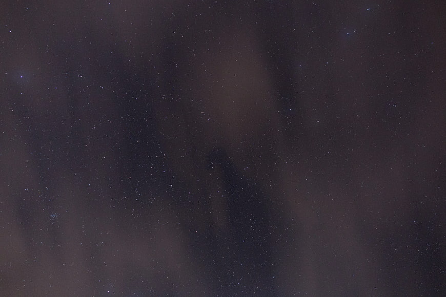 Dark Night Sky With Stars and Nebula Dust