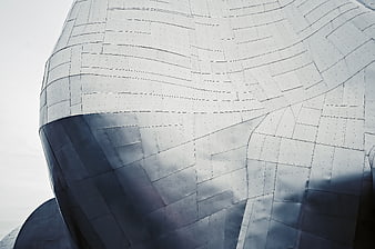 Close-up of Curved Metallic Architectural Facade Panels