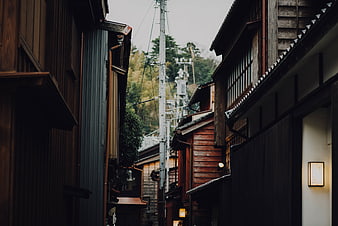 Narrow Alley Between Traditional Japanese Wooden Buildings