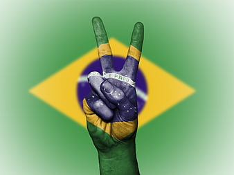 Hand Painted With Brazilian Flag Making Peace Sign