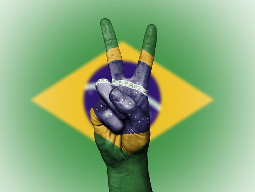 Hand Painted With Brazilian Flag Making Peace Sign