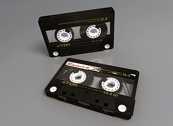 3D Render of Black TDK Cassette Tapes on Gray Background