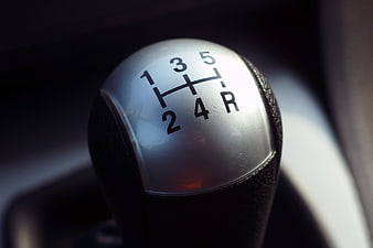 Close-up of a 5-speed manual car gear stick