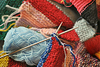 Colorful Knitting Yarn and Needles Close-Up