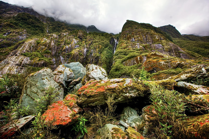 Mossy Rocks and Waterfalls in New Zealand Mountain Landscape