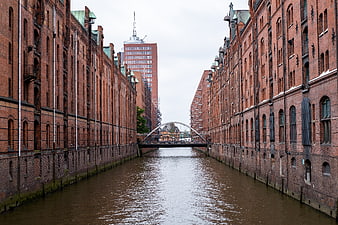 Historic Brick Warehouses Lining a Canal in Hamburg