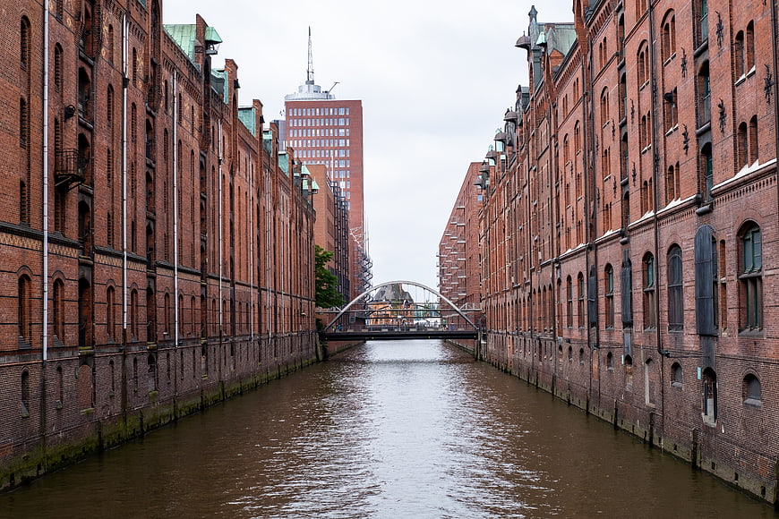 Historic Brick Warehouses Lining a Canal in Hamburg