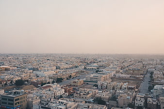 Aerial View of Dense Middle Eastern Cityscape at Dusk