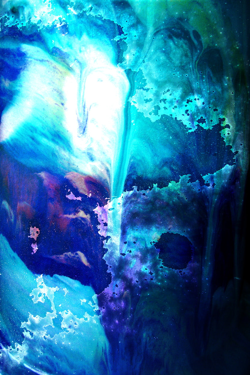 Abstract blue and teal fluid art background with glowing texture
