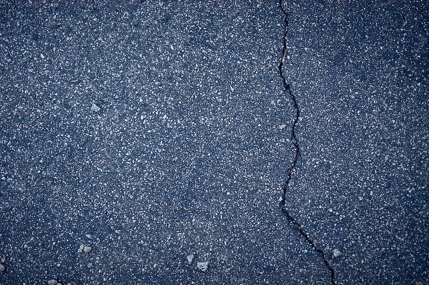 Cracked Asphalt Road Texture Background