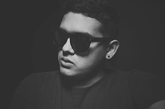 Black and white portrait of man wearing sunglasses