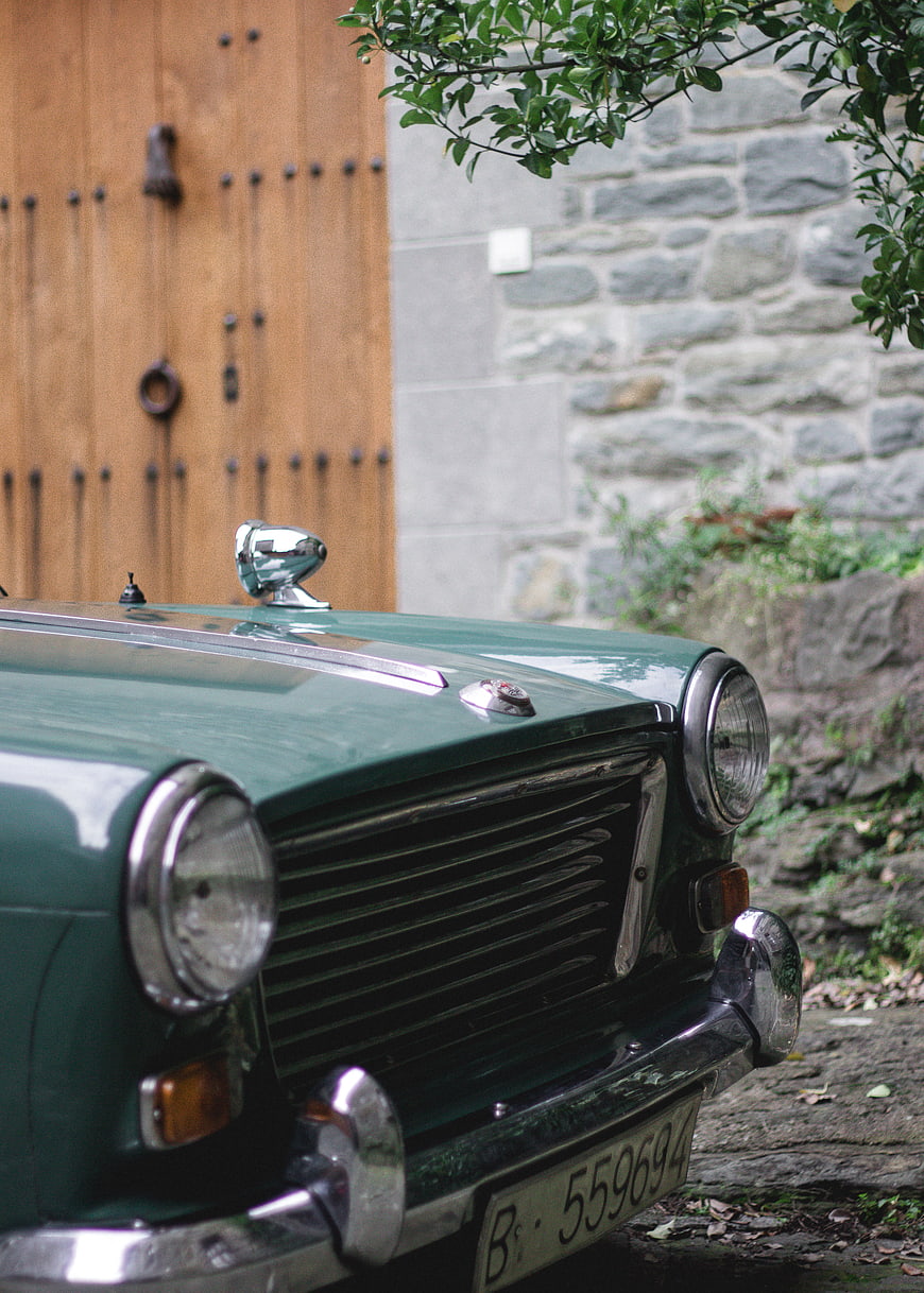 Close-up of vintage green classic car front grille