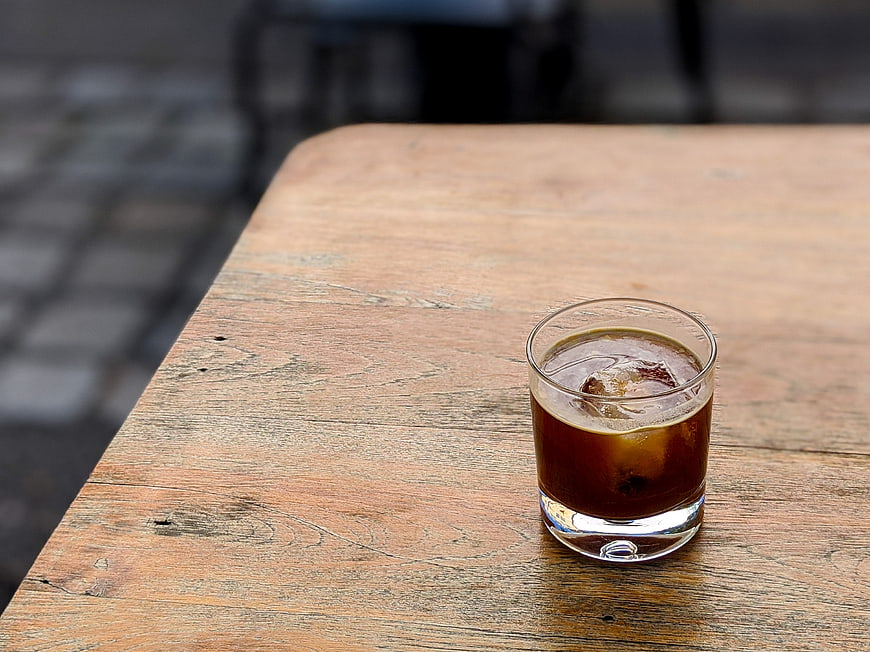 Iced Americano Coffee on Rustic Wooden Table