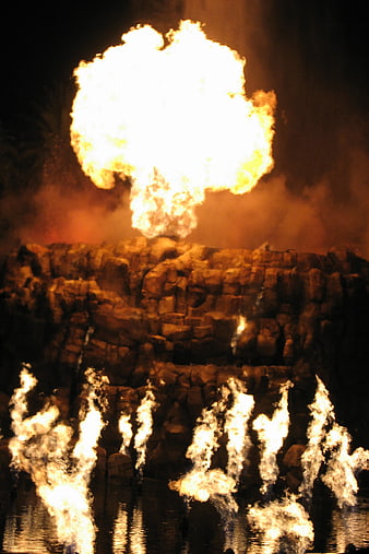 Dramatic Nighttime Fire Show with Volcanic Eruption Effect