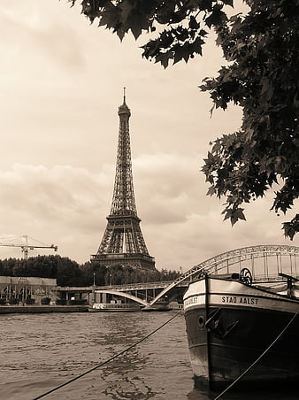 Vintage Sepia Eiffel Tower View from Seine River with Boat