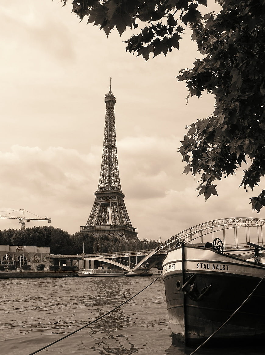 Vintage Sepia Eiffel Tower View from Seine River with Boat