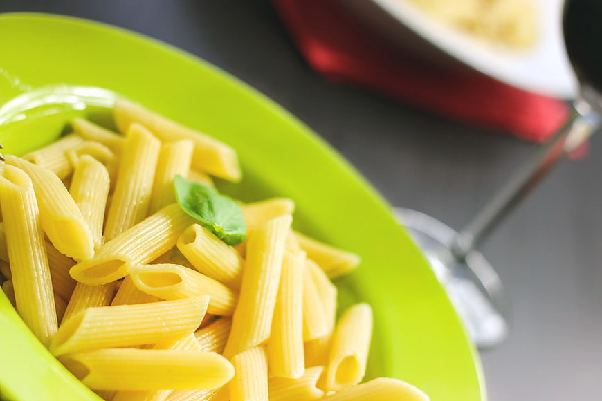 Close-up of Penne Pasta on Green Plate