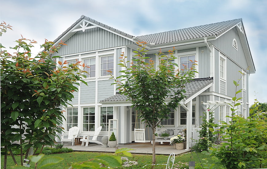 Modern Scandinavian Gray House with White Porch and Garden